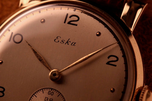1950s 18k Eska - Sculpted Lugs